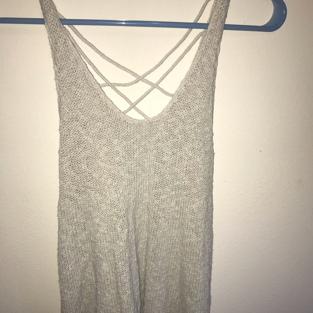 Knit tank top with cross-hatch back.